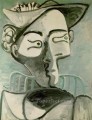 Mujer sentada con sombrero 1962 Pablo Picasso